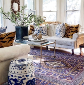 A vibrant, yet relaxing living room designed by CJ Swank using antiques and vintage elements sourced from online auctions, estate sales, and thrift shops. | BRG