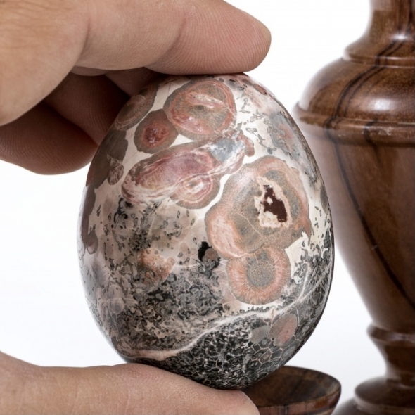 One of four unique and colorful jasper stone eggs with wooden stands (item #256291) from the estate collection of Dr. Paul Zahl | BRG