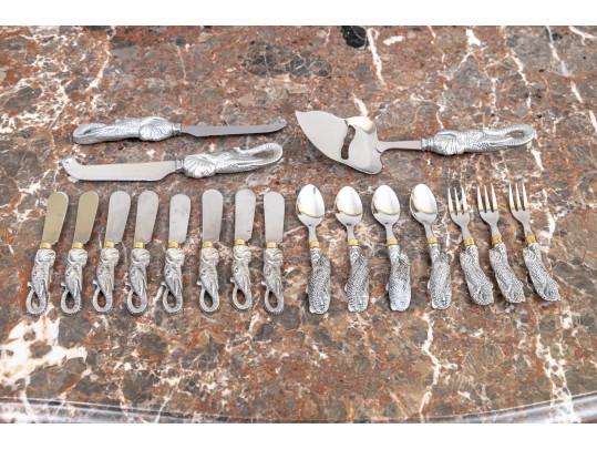 Partial Flatware Set With Cast Figural Handles