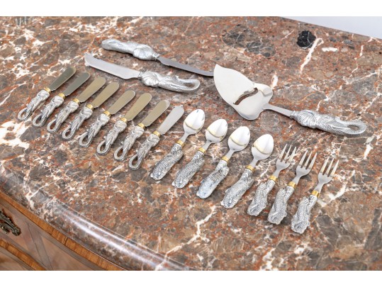 Partial Flatware Set With Cast Figural Handles