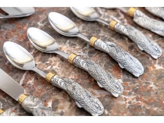 Partial Flatware Set With Cast Figural Handles