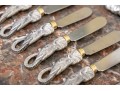 Partial Flatware Set With Cast Figural Handles