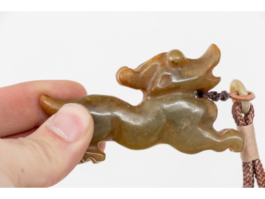 Playful Chinese Celadon And Russet Jade Kylin Form Toggle