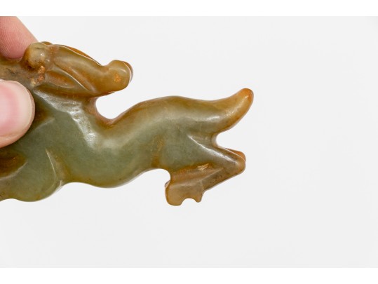 Playful Chinese Celadon And Russet Jade Kylin Form Toggle