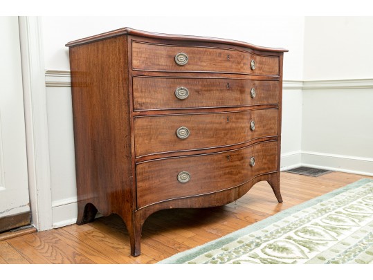 A George III Mahogany Serpentine Dresser