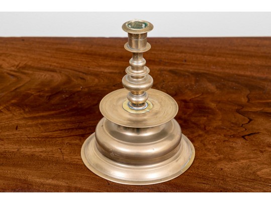 An 18th Century English Queen Anne Brass Candlestick
