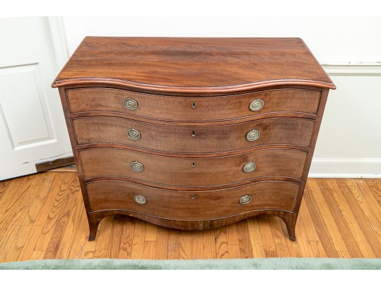 A George III Mahogany Serpentine Dresser