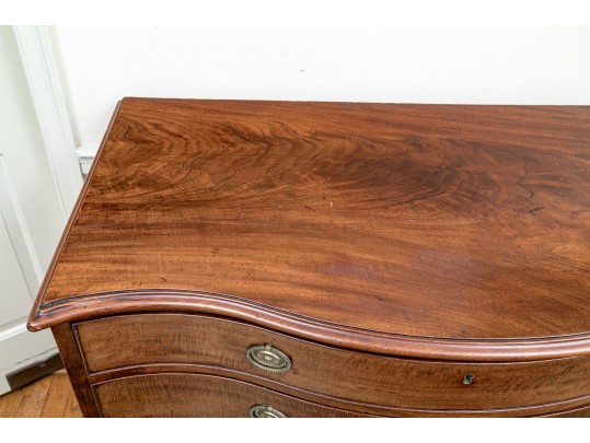 A George III Mahogany Serpentine Dresser