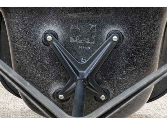 A Mid Century Modern Black Fiberglass Shell Chair