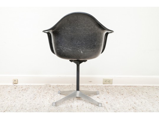 A Mid Century Modern Black Fiberglass Shell Chair