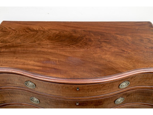A George III Mahogany Serpentine Dresser