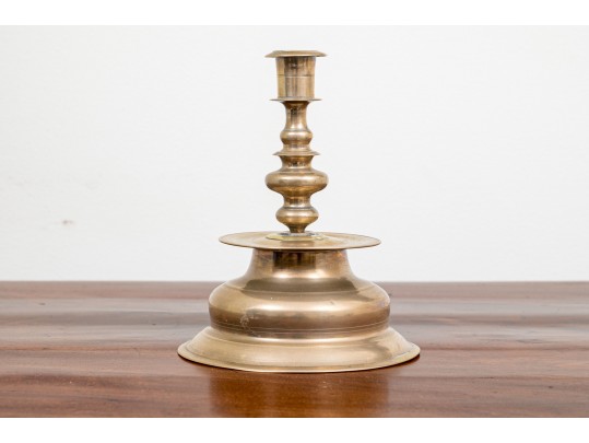 An 18th Century English Queen Anne Brass Candlestick