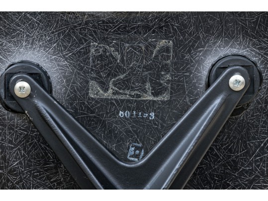 A Mid Century Modern Black Fiberglass Shell Chair