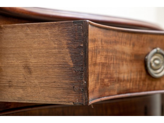A George III Mahogany Serpentine Dresser