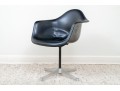 A Mid Century Modern Black Fiberglass Shell Chair