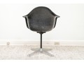 A Mid Century Modern Black Fiberglass Shell Chair