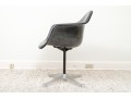 A Mid Century Modern Black Fiberglass Shell Chair