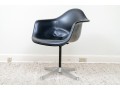 A Mid Century Modern Black Fiberglass Shell Chair