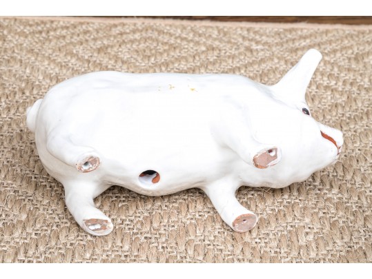 A Family Of Three French White Glazed Terracotta Pigs