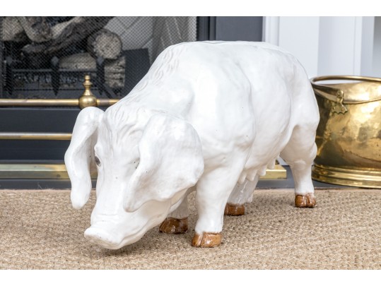 A Family Of Three French White Glazed Terracotta Pigs