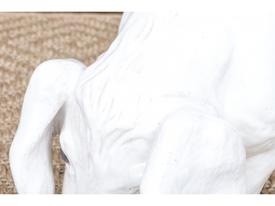 A Family Of Three French White Glazed Terracotta Pigs