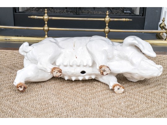 A Family Of Three French White Glazed Terracotta Pigs