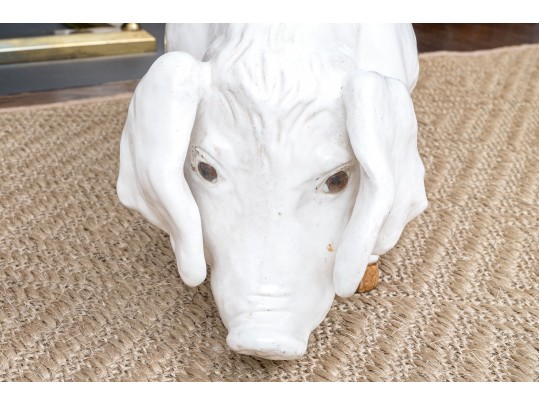 A Family Of Three French White Glazed Terracotta Pigs