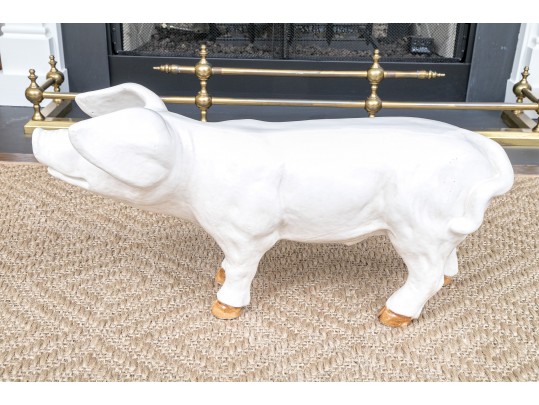 A Family Of Three French White Glazed Terracotta Pigs