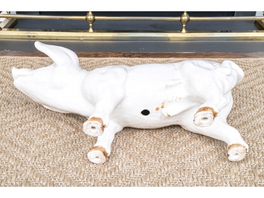 A Family Of Three French White Glazed Terracotta Pigs