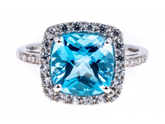 Vibrant 10K White Gold And Blue Topaz Ring, Size 7.25