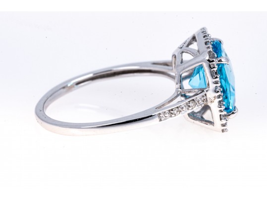 Vibrant 10K White Gold And Blue Topaz Ring, Size 7.25