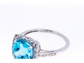 Vibrant 10K White Gold And Blue Topaz Ring, Size 7.25