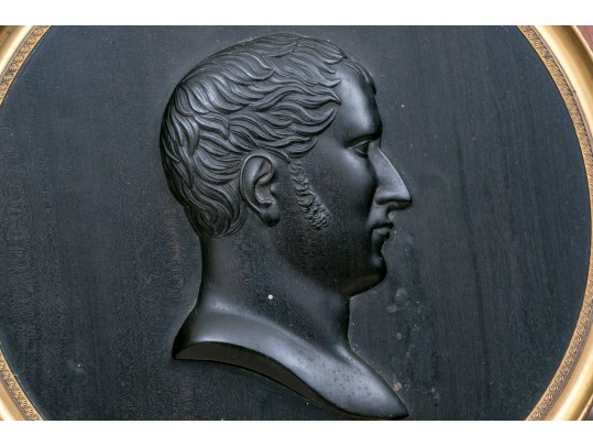 A Carved Ebony Wall Plaque Of Young Napoleon
