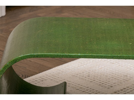 A Mid Century Laminated Wood And Sea Glass Covered Coffee Table