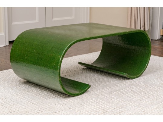 A Mid Century Laminated Wood And Sea Glass Covered Coffee Table