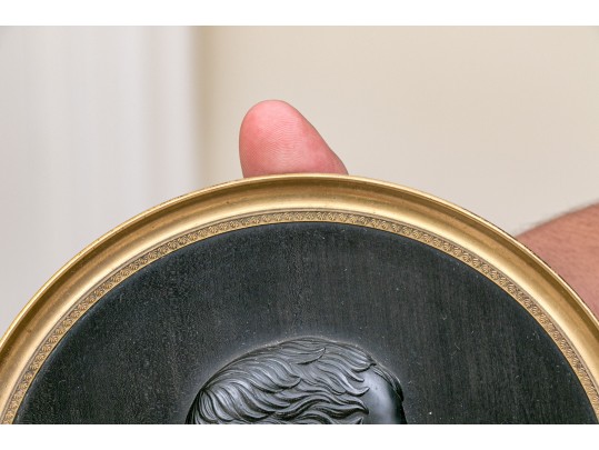 A Carved Ebony Wall Plaque Of Young Napoleon