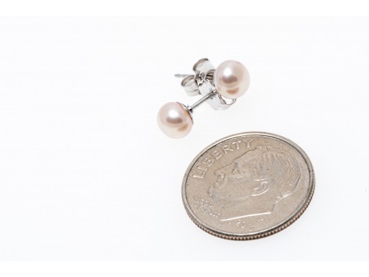 Six Sterling And Cultured Pearl Stud Earrings