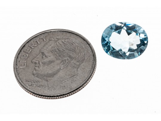 Loose Stone: One Oval Faceted Light Blue Topaz, 