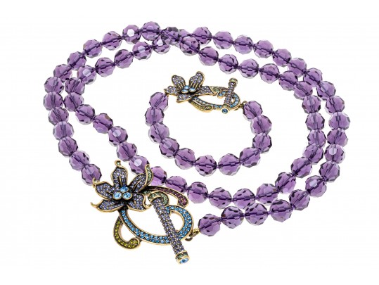 Heidi Daus Stunning Necklace Displays Beads Of Purple Crystal, And Floral Clasps 