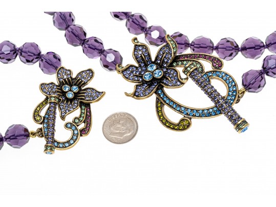 Heidi Daus Stunning Necklace Displays Beads Of Purple Crystal, And Floral Clasps 