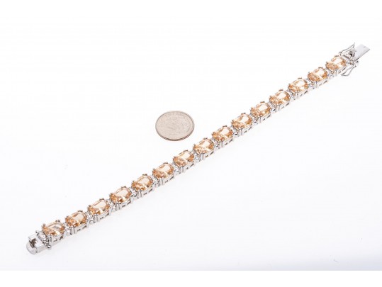 Sterling Silver Bracelet Of Peachy Pink Zirconia