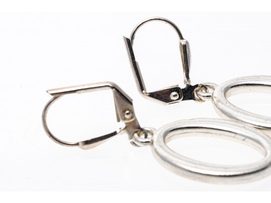 Sleek And Stylish Pair Of Oval Pendant Earrings 