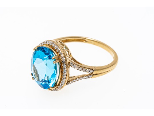 10k Yellow Gold Striking Blue Topaz And Diamond Halo Ring, Size 7