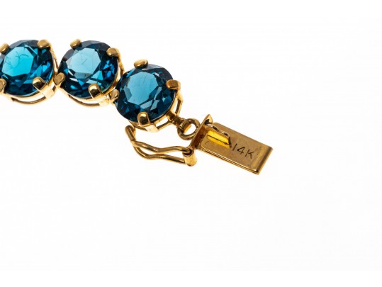 14k Yellow Gold Beautiful Oval London Blue Topaz Line Bracelet, App. 20.8 TCW
