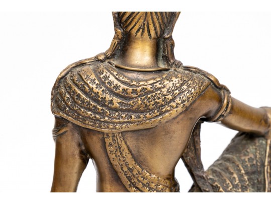 A 20th Century Asian Bronze Figure Of A Reclining Female Deity On A Rock