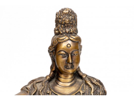 A 20th Century Asian Bronze Figure Of A Reclining Female Deity On A Rock