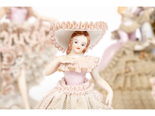 Group Of Four Porcelain & Lace Figurines