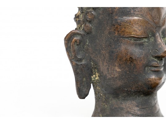 An Antique Small Bronze Dark Patinated Head Of Buddha, With Headdress