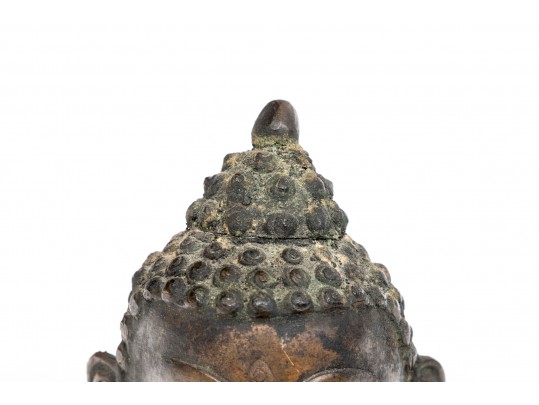 An Antique Small Bronze Dark Patinated Head Of Buddha, With Headdress