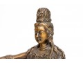 A 20th Century Asian Bronze Figure Of A Reclining Female Deity On A Rock
